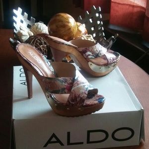 Aldos multicolor heels with gold accents.